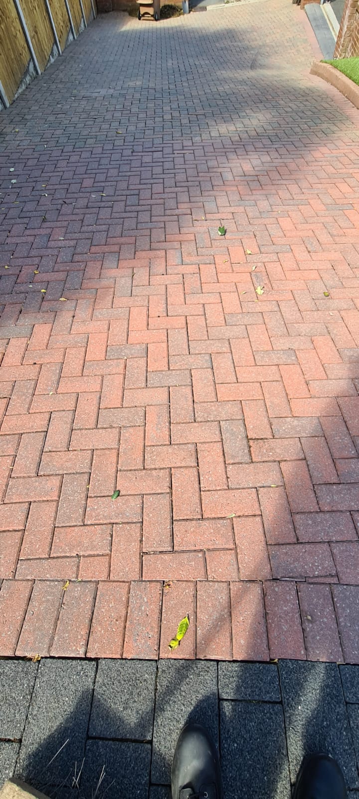 Brick wall and paving cleaned during Wirral pressure washing