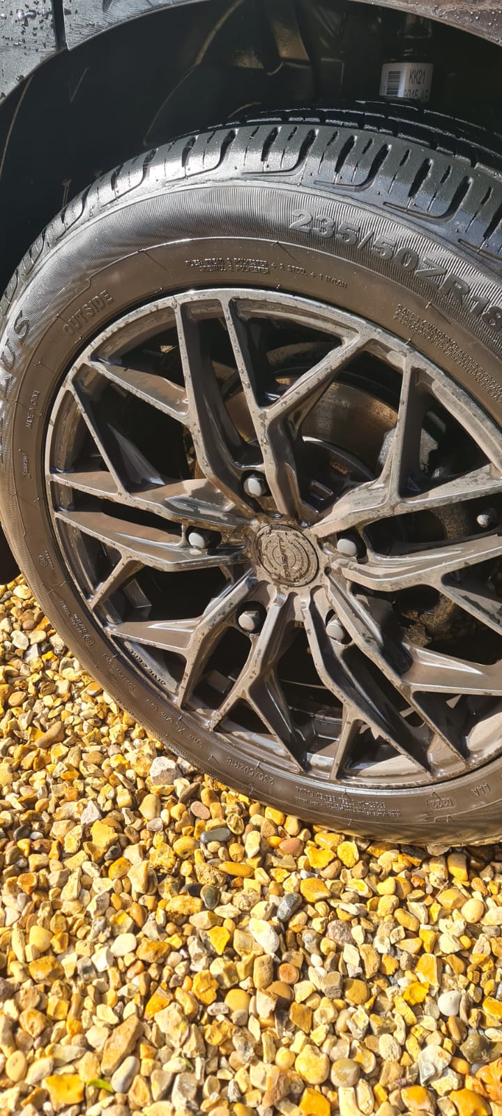 Dirty alloy wheel and tyre before a Wirral car valet