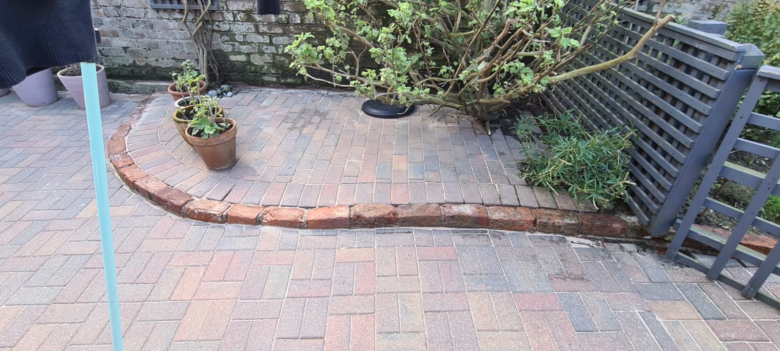Yellow and red patio slabs cleaned during a Wirral patio clean