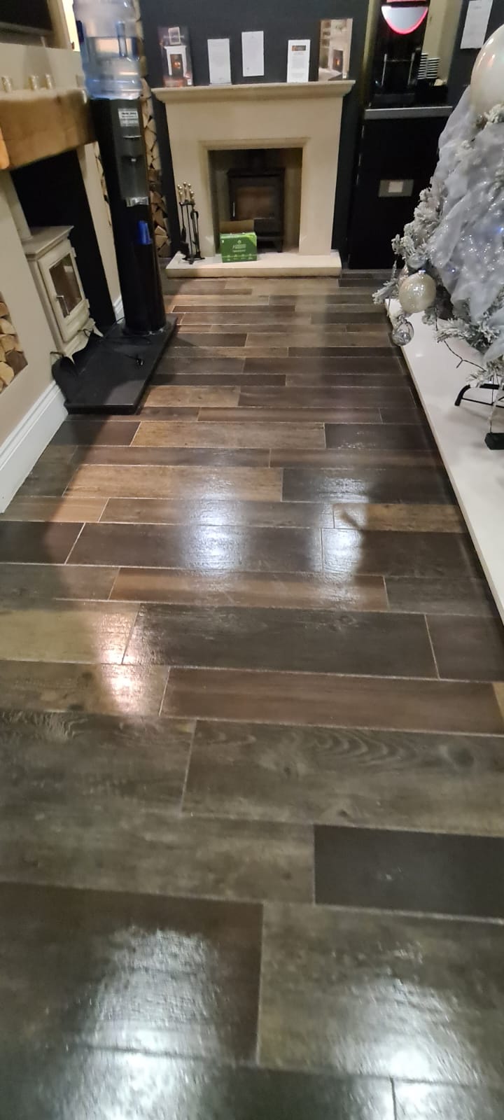 Wood effect tiled floor cleaned and polished in the Wirral