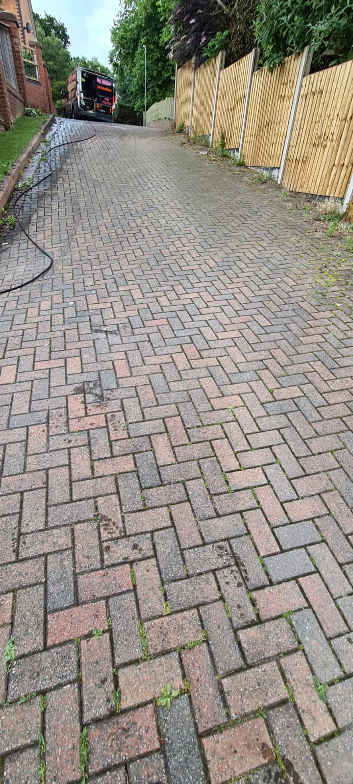 Dirty block paved driveway before pressure washing in the Wirral