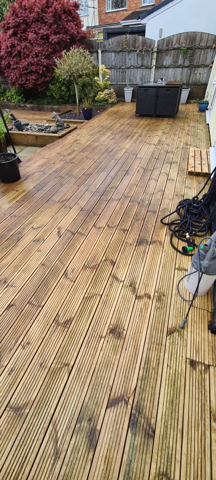 Stone patio jet washed and rinsed at a Wirral property