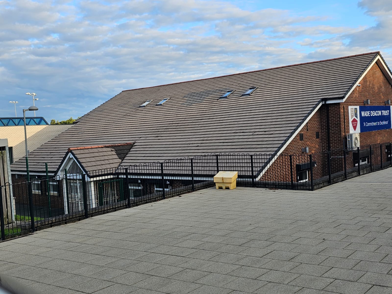 Clean roof and surrounding paving at a Wirral school