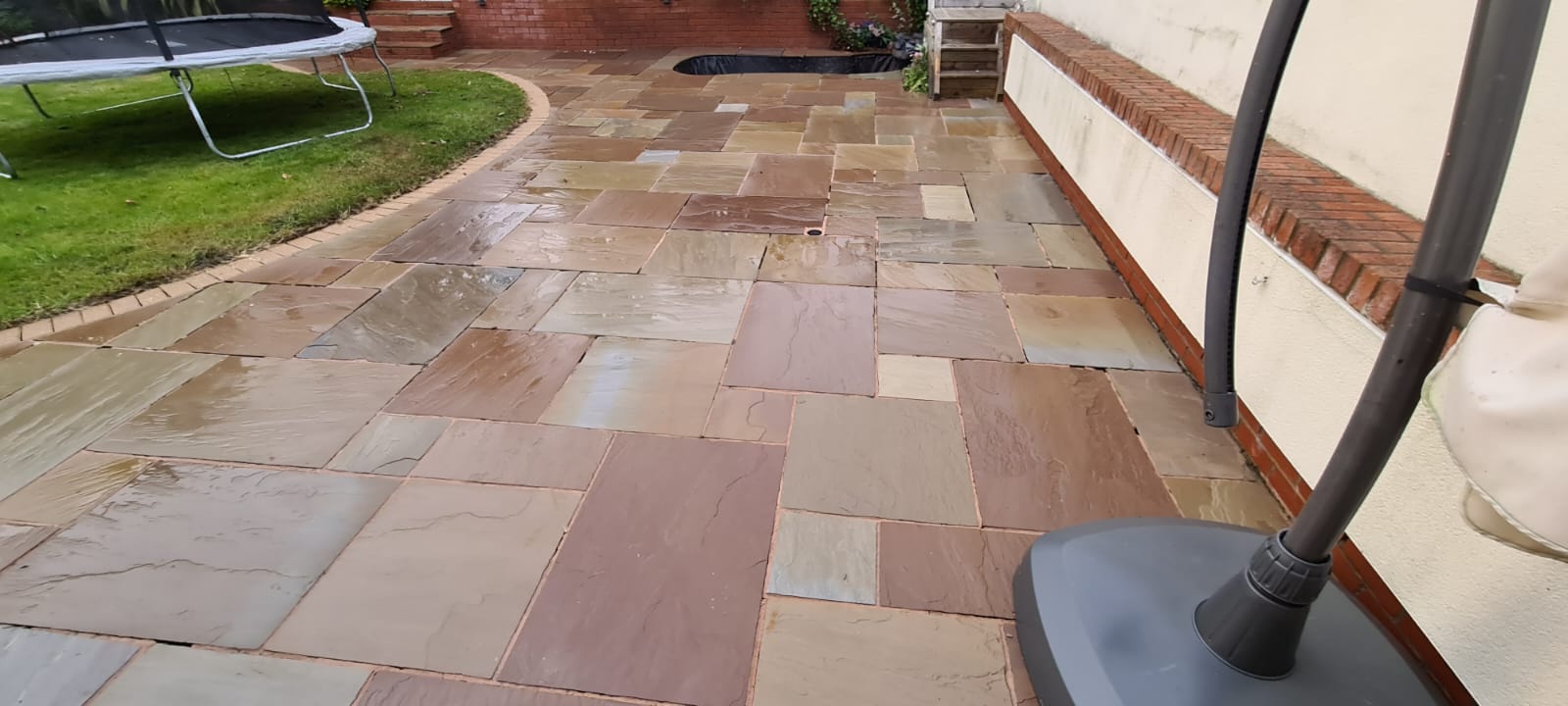 Jet washed brick paving at a Wirral home after pressure washing