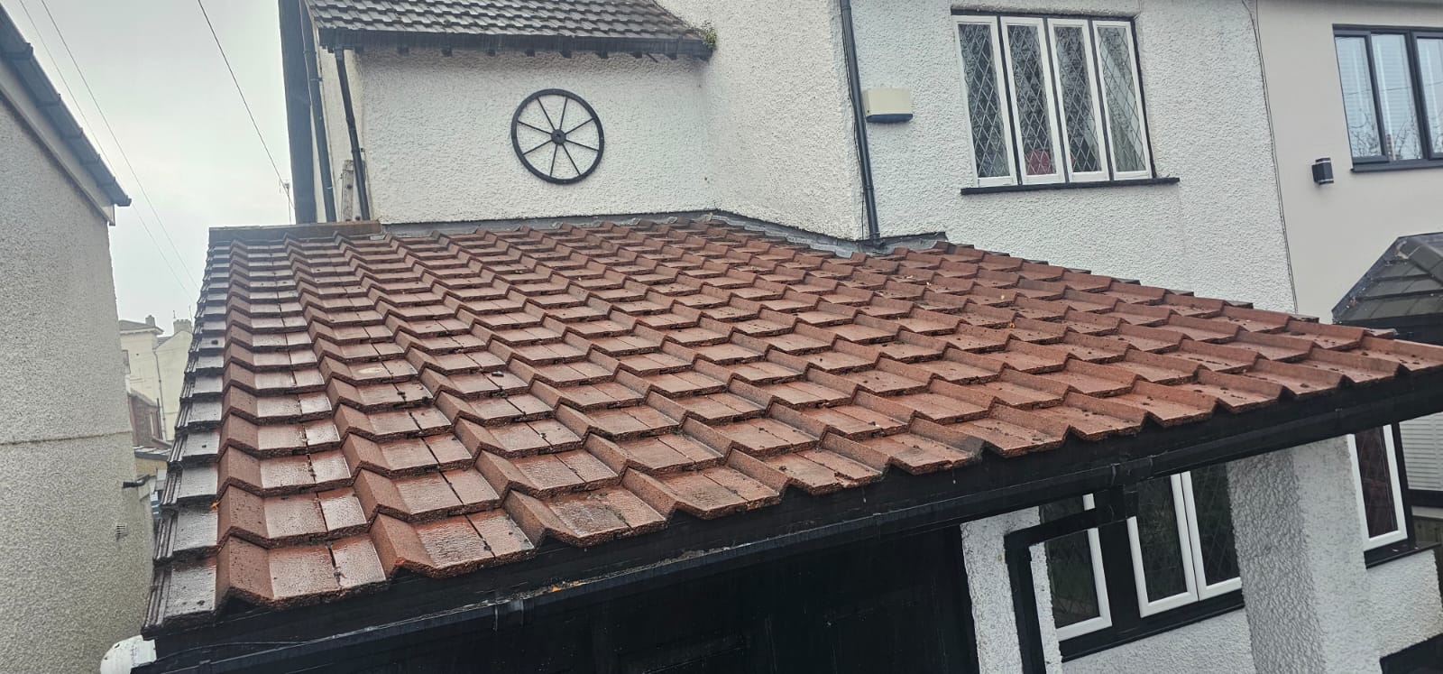 Cleaned pale roof tiles on a Wirral home