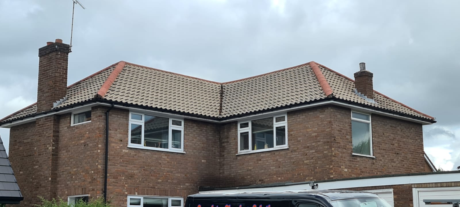 Clean roof ridge tiles after a Wirral roof clean