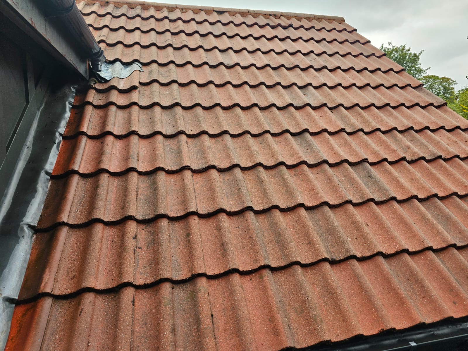 Clean school roof viewed from the front in the Wirral